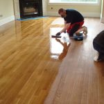 What is solid hardwood floor sanding and why is it important?
